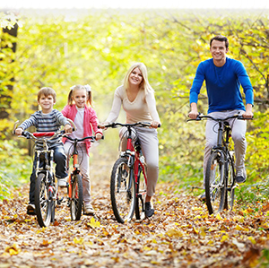 Family riding bikes